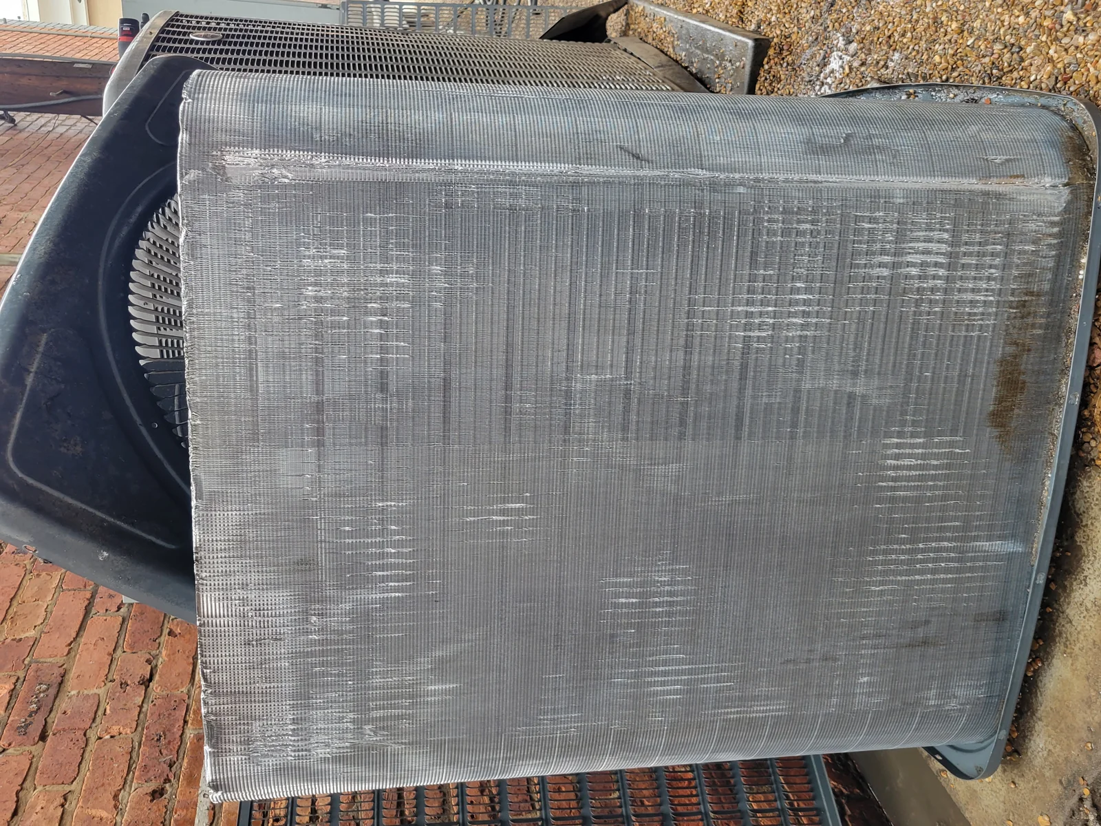 Clean condenser coil after maintenance