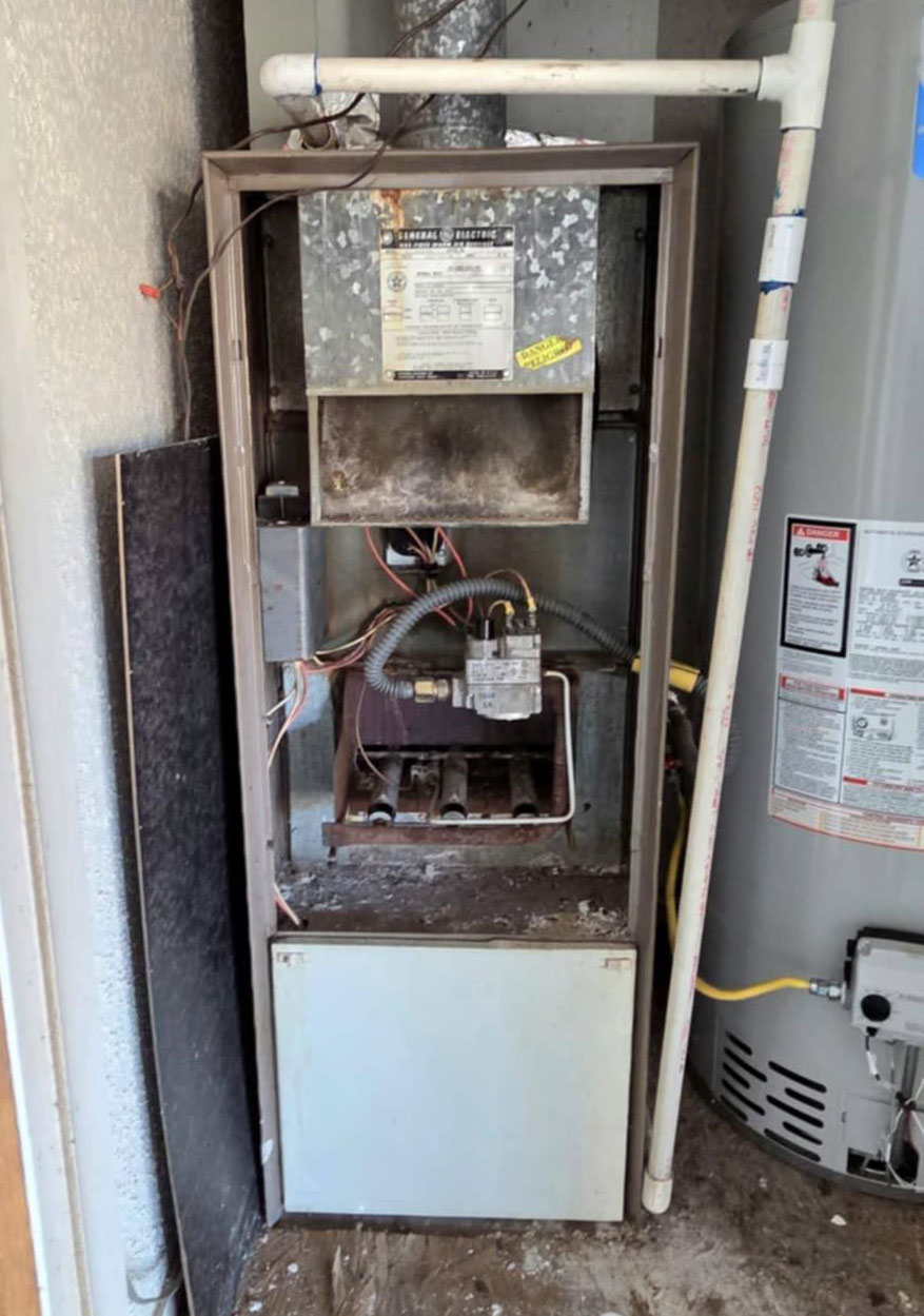 Old furnace before replacement
